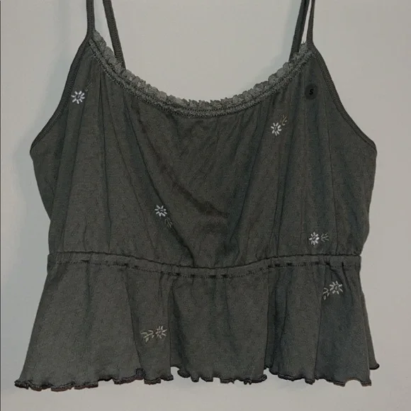 Both white and olive version of these small flower tank tops. - Picture 2 of 2
